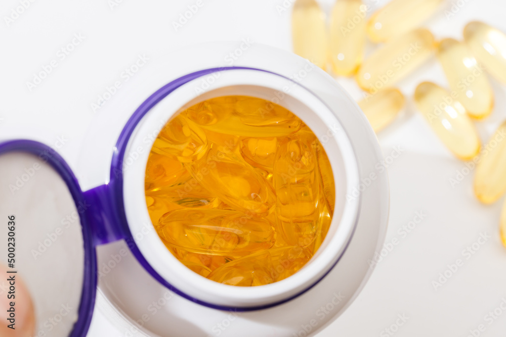 Close up of oil filled capsules suitable for: fish oil, omega 3, omega 6, omega 9, vitamin A, vitamin D, vitamin D3, vitamin E - Image Close up of oil filled capsules suitable for: fish oil, omega 3, omega 6, omega 9, vitamin A, vitamin D, vitamin D3, vitamin E - Image
