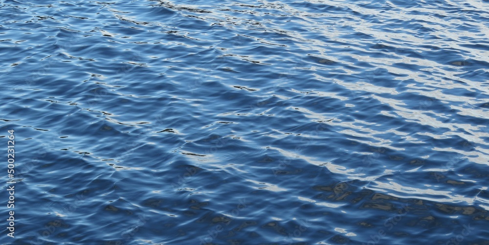 Blue water surface with soft waves on Florida river, natural background Blue water surface with soft waves on Florida river, natural background