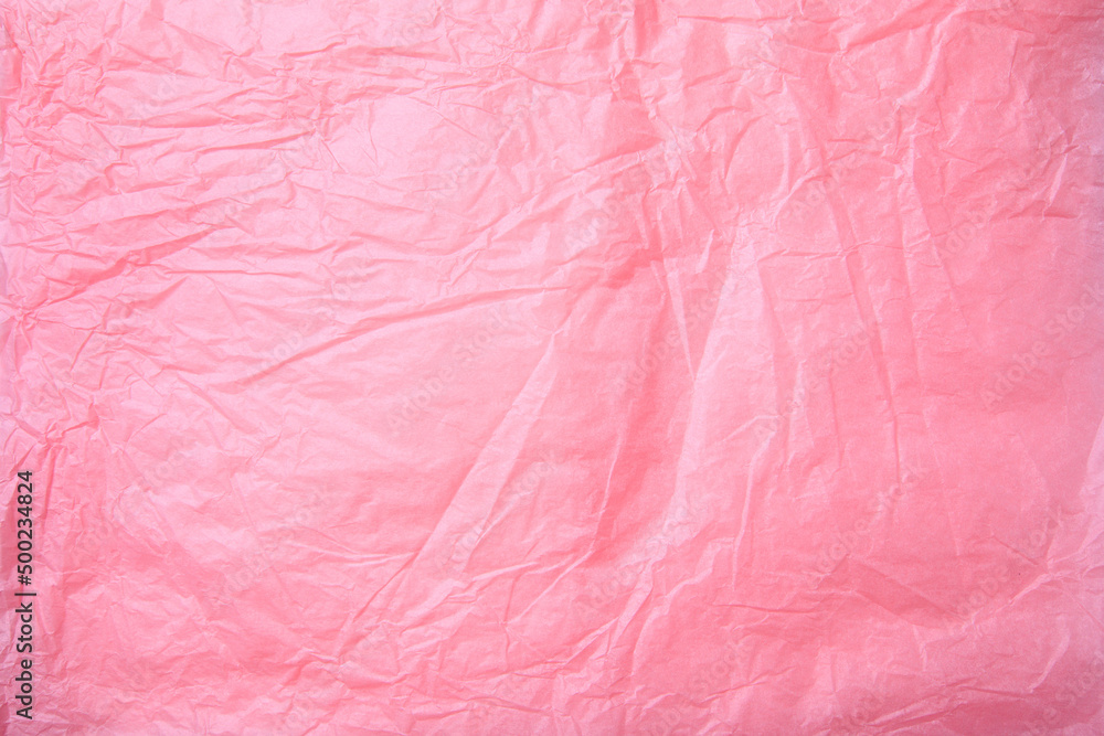 Fototapeta premium Crumpled recycle pink paper background - Pink paper crumpled texture - Image