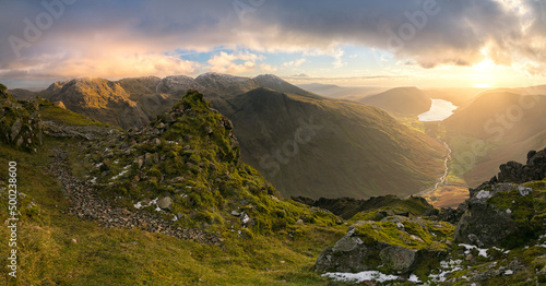 Papier peint Panorama from the summit of Great Gable, with dramatic cloud above as the sun be