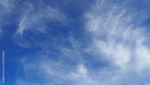 background of blue sky with clouds in clear weather