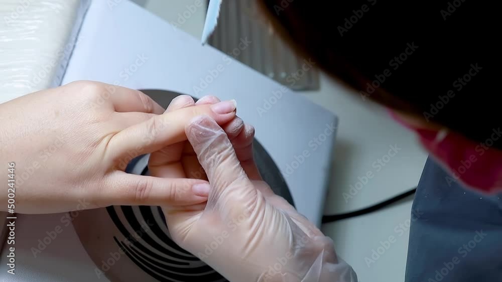 procedure filing nails with a nail file manicure master gives shape to nails procedure filing nails with a nail file manicure master gives shape to nails