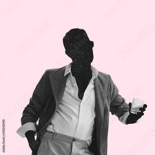 Contemporary art collage. Faceless brutal stylish man holding alcohol glass isolated over pink background photo