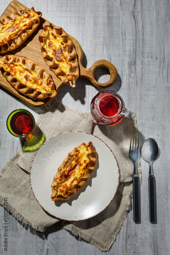 Finnish Traditional Pasties Or Pirogs - Karelian Pasties, Karelian Pies Or Karelian Pirogs From Region Of Karelia. photo