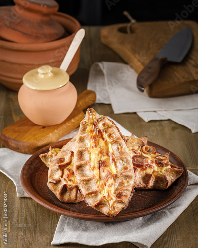 Finnish Traditional Pasties Or Pirogs - Karelian Pasties, Karelian Pies Or Karelian Pirogs From Region Of Karelia. photo