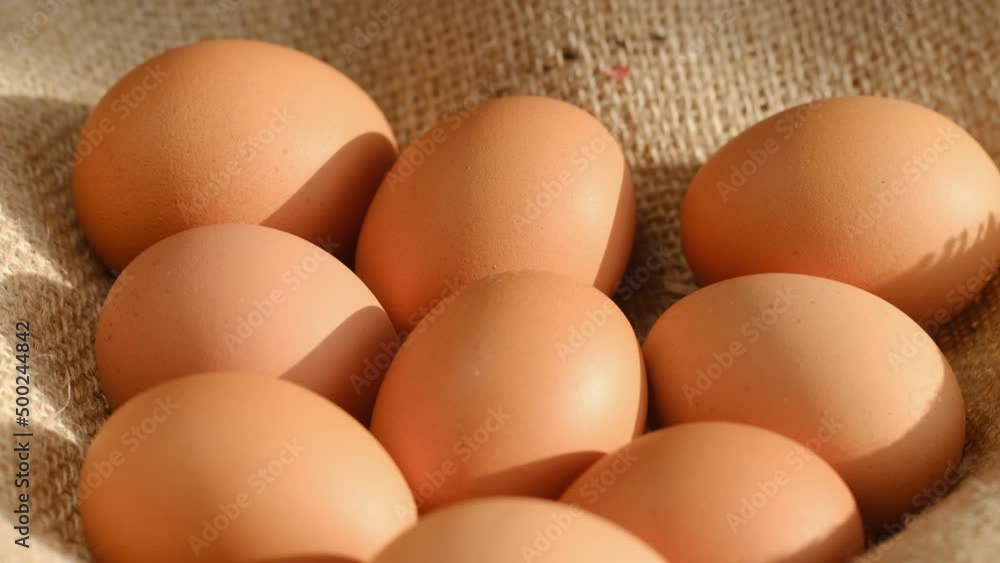Chicken egg, rotation shot, Chicken fresh raw eggs.Healthy fresh food ingredients for breakfast. Animal products. Grocery. Chicken farm fresh eggs Chicken egg, rotation shot, Chicken fresh raw eggs.Healthy fresh food ingredients for breakfast. Animal products. Grocery. Chicken farm fresh eggs