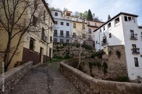Fototapeta Naklejka Na Ścianę i Meble -  Walking in old central part of world heritage city Granada, Andalusia, Spain