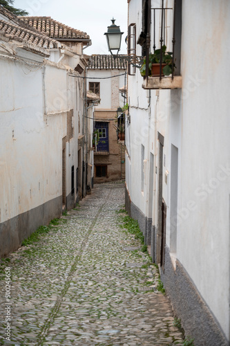 Walking in old central part of world heritage city Granada, Andalusia, Spain © barmalini