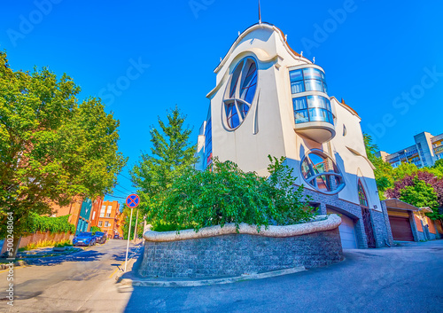 Canvastavla The scenic house on Barikadna street with oval windows and curvad fence, Dnipro,