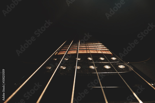 Close-up view of Six-string electric guitar pickup.
