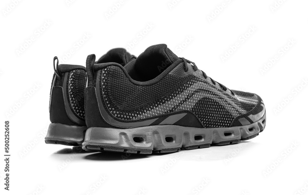 Sport shoes isolated on white background. Black sneakers running shoes.