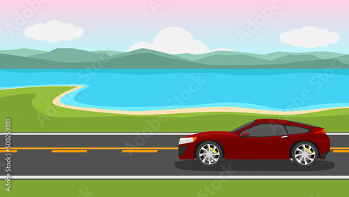 Traveling sport cars red color. Driving on an asphalt road. with. Environment of sand beach and far away island. Under evening sky and white clouds. © thongchainak