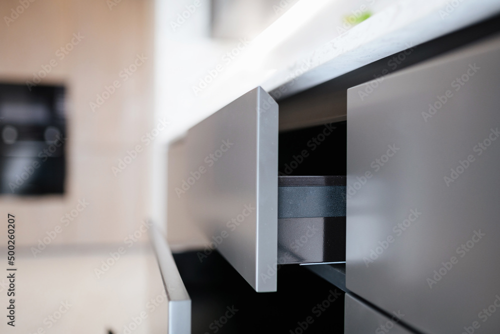 open shelf in the new kitchen in the interior of the house