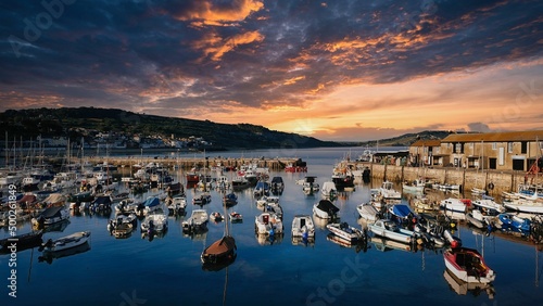 Harbour with boats and sunset