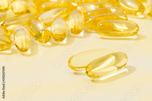 Close up of oil filled capsules suitable for: fish oil, omega 3, omega 6, omega 9, vitamin A, vitamin D, vitamin D3, vitamin E - Image