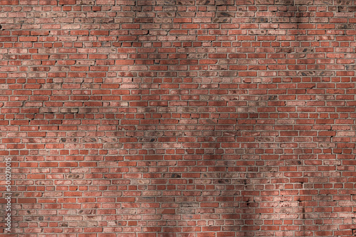 Old red brick wall background texture, free copy space.