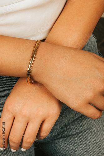female gold bracelet on girl hand, female accessory, jewelry, gold bracelet with stone, female jewelry, girl bracelet on her arm, gold bracelet with stone