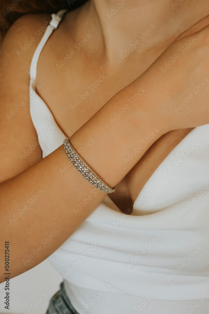 female gold bracelet on girl hand, female accessory, jewelry, gold bracelet with stone, female jewelry, girl bracelet on her arm, gold bracelet with stone