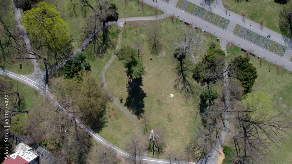 Aerial Drone Birds Eye View Above European Green Park Spaces And Footpaths With People In Olomouc, Czech Republic In Autumn Aerial Drone Birds Eye View Above European Green Park Spaces And Footpaths With People In Olomouc, Czech Republic In Autumn