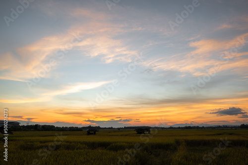 Colorful sunset and sunrise with clouds. Blue and orange color of nature. Many white clouds in the blue sky. The weather is clear today. sunset in the clouds. The sky is twilight.