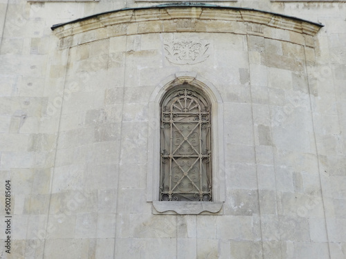 Arch Church Window with a Beautiful Grating