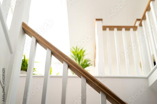 Fotografija Shallow focus of a wooden stair banister seen looking into a newly converted loft conversion