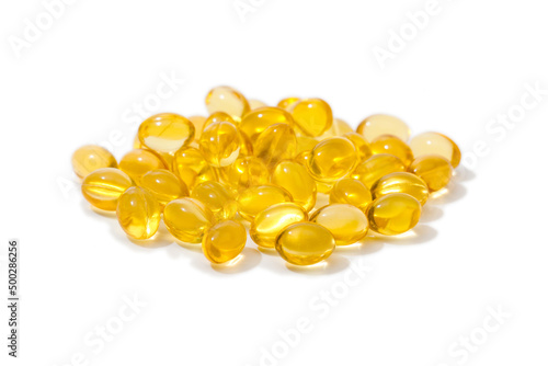 Close up of  oil filled capsules suitable for: fish oil, omega 3, omega 6, omega 9,  vitamin A, vitamin D, vitamin D3, vitamin E - Image