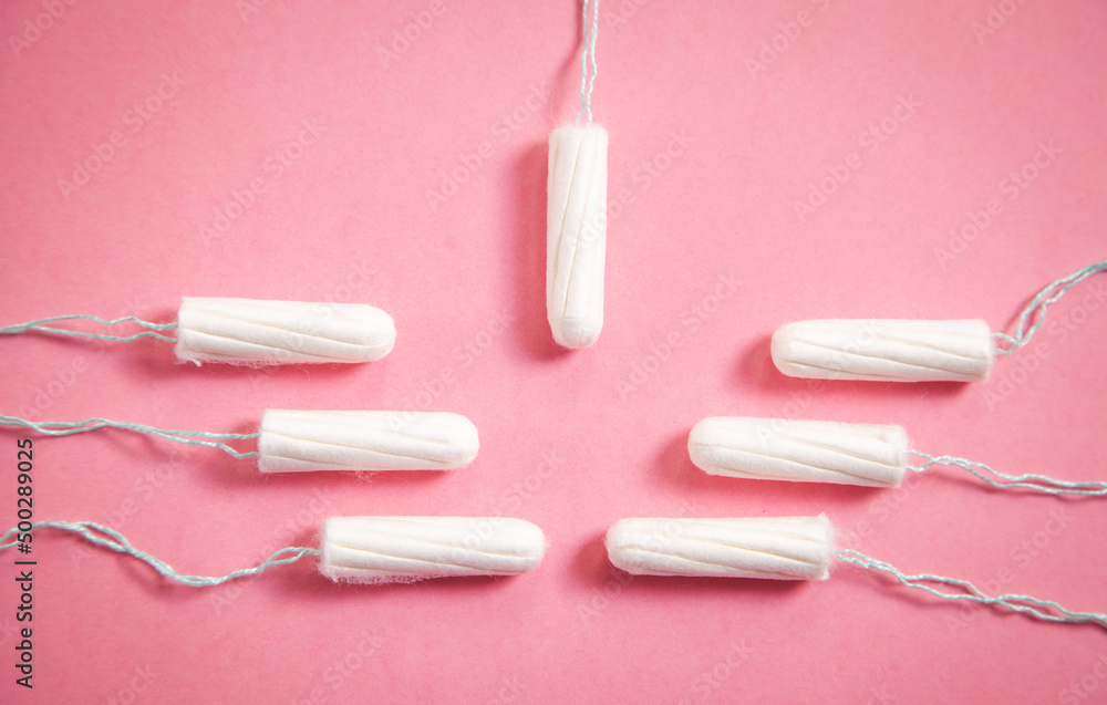 Menstrual tampon on a pink background. Menstrual tampon on a pink background.