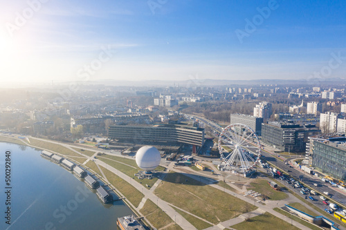 Aerial view tourist attractions in Krakow Poland. ballon and Ferris wheel. from Panorama in the morning spring fog. view from above