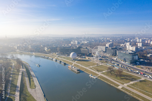 Wallpaper Mural attractions at the Visla river in Krakow Poland. ballon and Ferris wheel. from Panorama in the morning mist. Aerial drone view from above. Sprink morning for under the city Torontodigital.ca