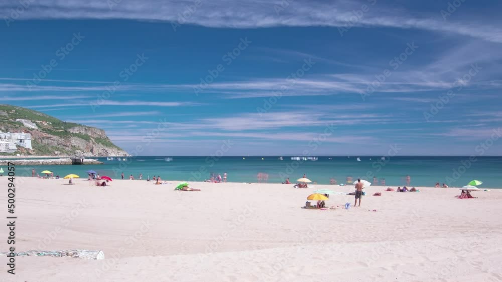 Beach in Sesimbra with moving clouds, Portugal timelapse Beach in Sesimbra with moving clouds, Portugal timelapse
