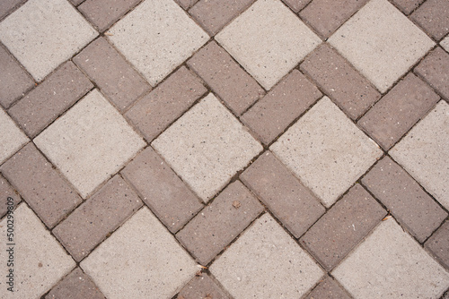 Paver. material for covering sidewalks  streets  approaches to buildings. 