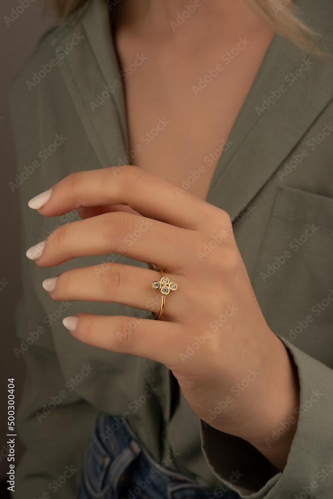 People, fashion, jewelry and luxury concept, closeup of woman wearing luxury jewelry