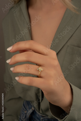 People, fashion, jewelry and luxury concept, closeup of woman wearing luxury jewelry