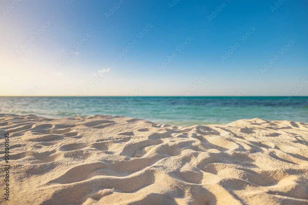 Closeup of sand on beach romantic summer sky. Panoramic beach landscape. Empty tropical beach and seascape. Orange and golden sunset sky soft sand calm, tranquil relaxing sunlight, summer vacation