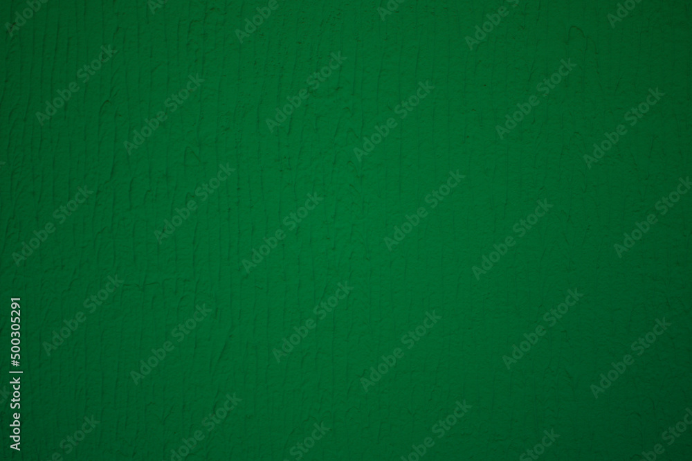 Emerald background, with a texture of facade plaster Emerald background, with a texture of facade plaster