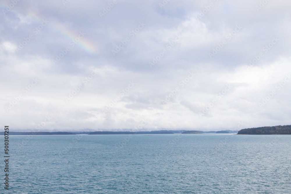 Storm clouds over the ocean and island