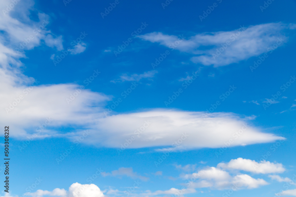 Blue sky cirrus clouds.