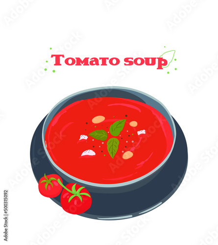 Tomato soup in a blue bowl. Soup puree from fresh tomatoes. Basil greens for soup Cold tomato soup. Gazpacho.