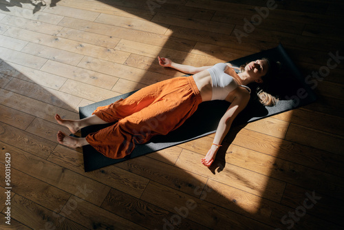 Yoga relaxation asana post-workout pose, harmony and balance of the soul
