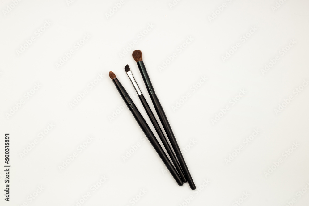 Makeup brushes on white background, template frame Makeup brushes on white background, template frame