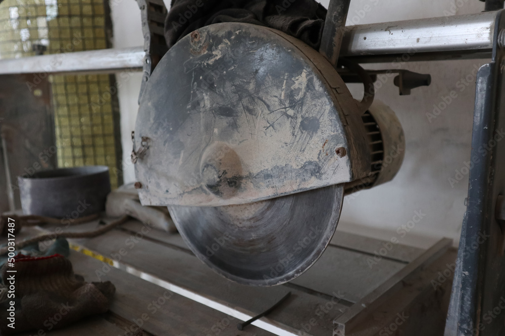 dusty circular saw in the workshop dusty circular saw in the workshop