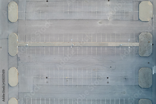 empty parking lot in front of the shopping center no one empty pavement. High quality photo