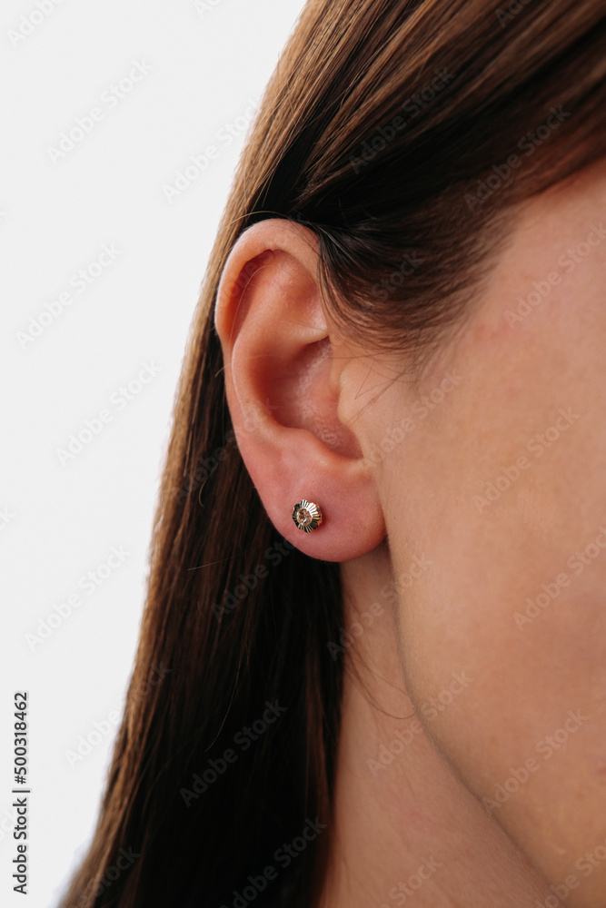 Beautiful girl. Fashion jewelry big earrings, dangle earrings and ball earrings for stylish and stylish woman. Fashion appearance, beauty and style. Natural makeup and easy styling Beautiful girl. Fashion jewelry big earrings, dangle earrings and ball earrings for stylish and stylish woman. Fashion appearance, beauty and style. Natural makeup and easy styling