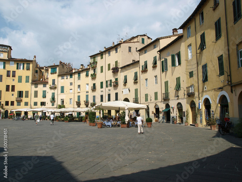 The Piazza Anfiteatro - Lucca , Italy. View from piazza Anfiteatro, former a Roman Ampitheatre, in Lucca. Tuscany, Italy.