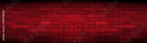 Cegły na czerwonym tle. Bricks on a red background.