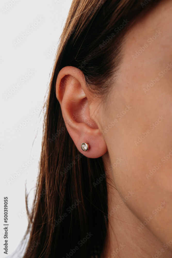 Beautiful girl. Fashion jewelry big earrings, dangle earrings and ball earrings for stylish and stylish woman. Fashion appearance, beauty and style. Natural makeup and easy styling Beautiful girl. Fashion jewelry big earrings, dangle earrings and ball earrings for stylish and stylish woman. Fashion appearance, beauty and style. Natural makeup and easy styling