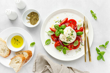 Salad Caprese with tomato, mozzarella and basil, italian food