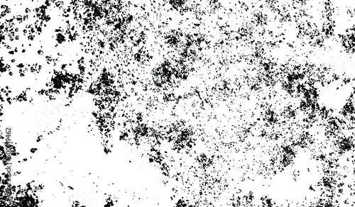 Small uneven spots and particles of debris. Abstract vector texture. Distressed uneven background. Grunge texture overlay with fine grains isolated on white background. Vector illustration. EPS10.