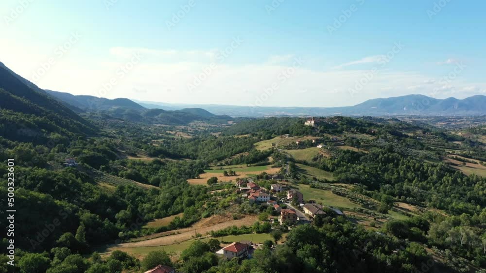 Aerial panoramic landscape of rural area with view on small village among picturesque mountains and forests. Impressive overlookings, Italy Aerial panoramic landscape of rural area with view on small village among picturesque mountains and forests. Impressive overlookings, Italy